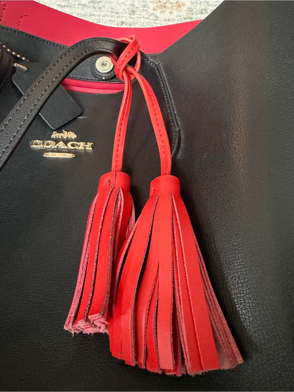 COACH Black Leather Tote Bag with Red Interior and Orange Tassel - Picture 4 of 7